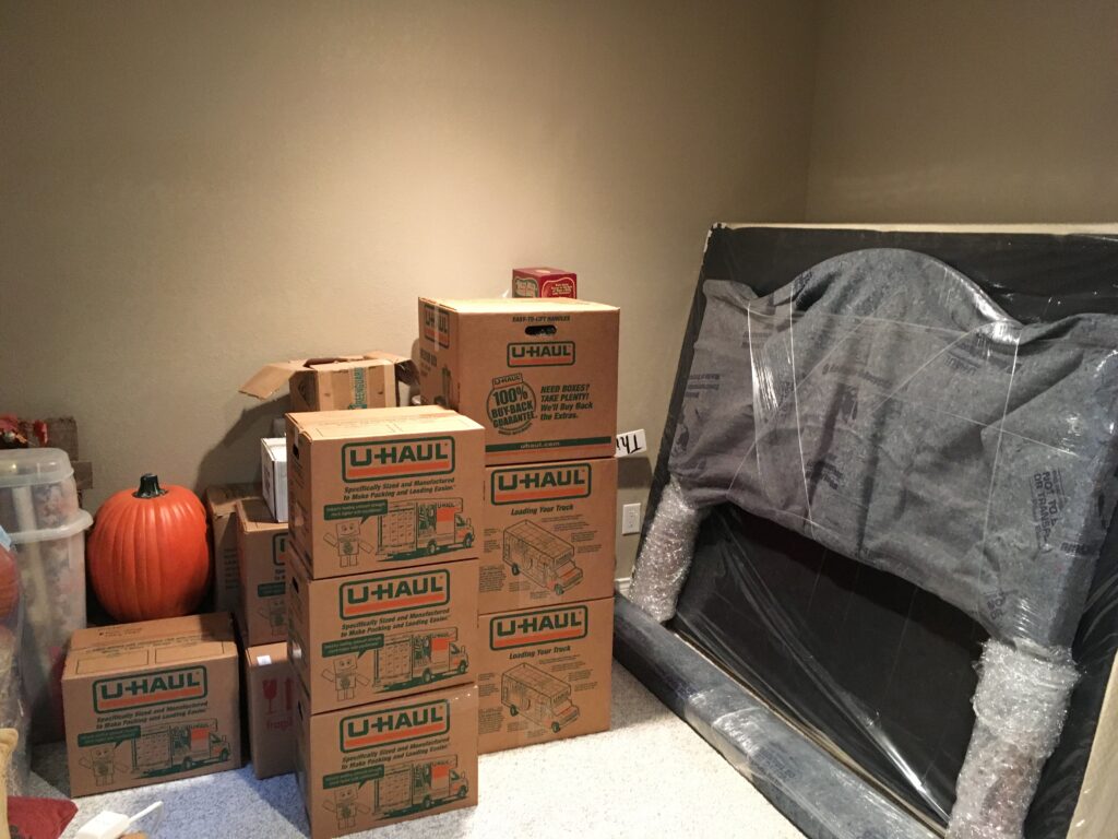 Pictures of moving boxes and furniture; random photos and stories for Small Town Scrap