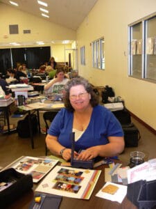 My friend Janelle making a scrapbook page at our retreat